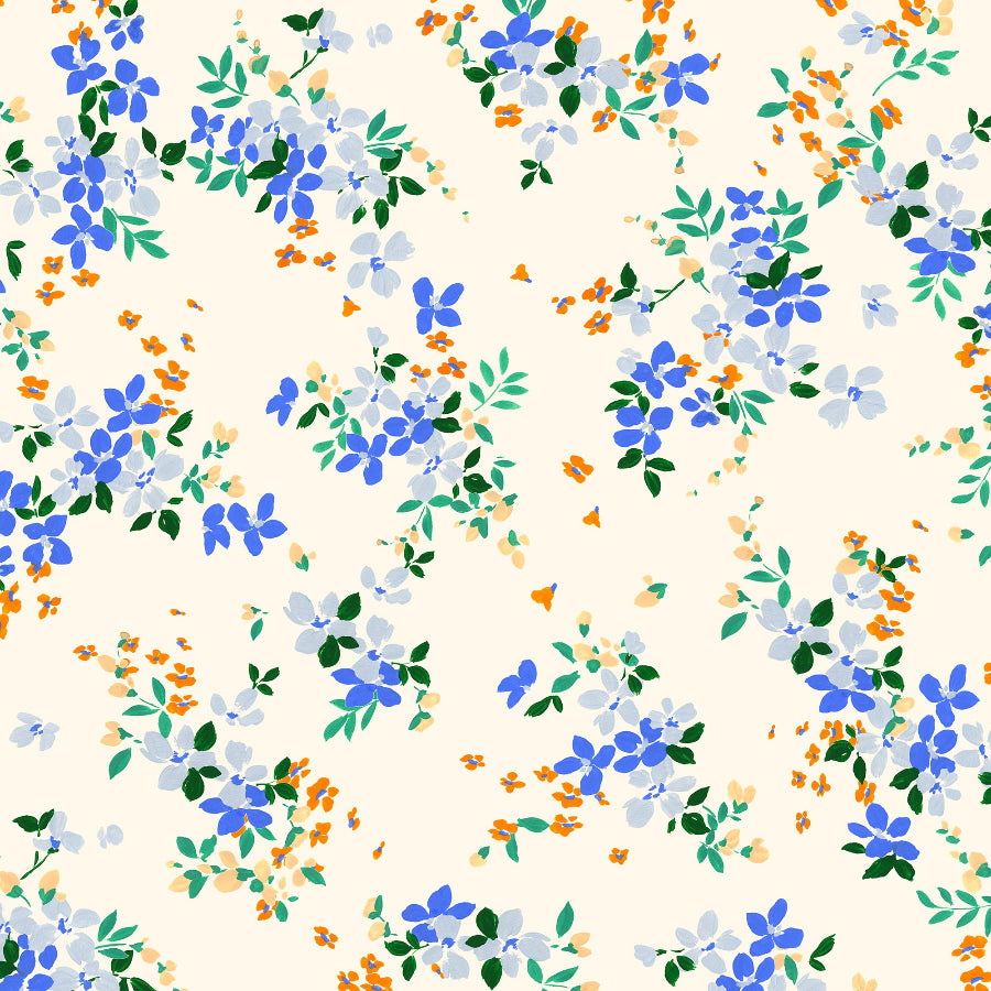 Floral pattern with blue, green, and orange flowers on a cream background