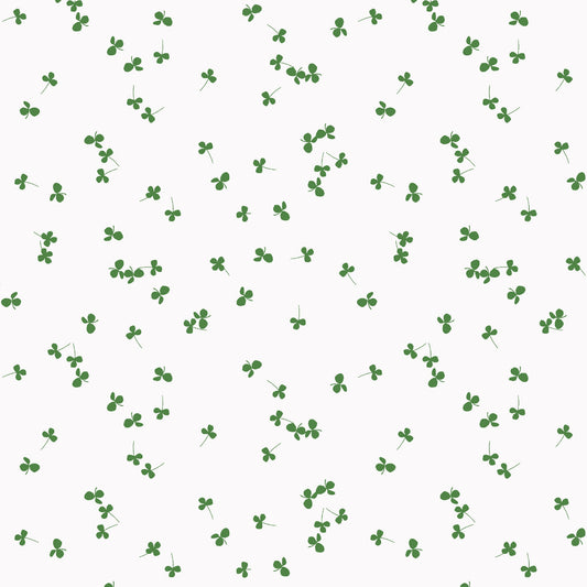 Pattern of green clover leaves on a white background