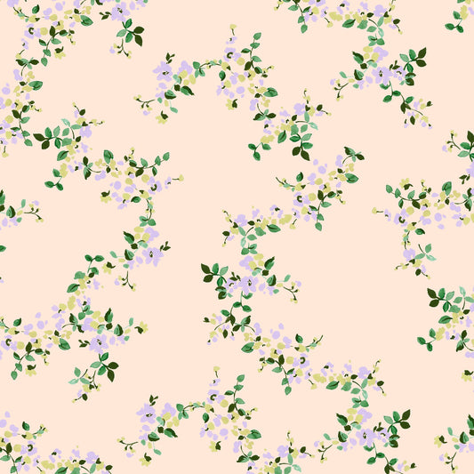 Floral pattern with green leaves and purple flowers on a blush background