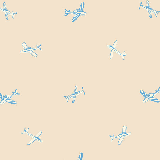Pattern of blue toy airplanes on a beige background