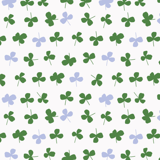 A pattern of green and purple clover leaves on a white background.
